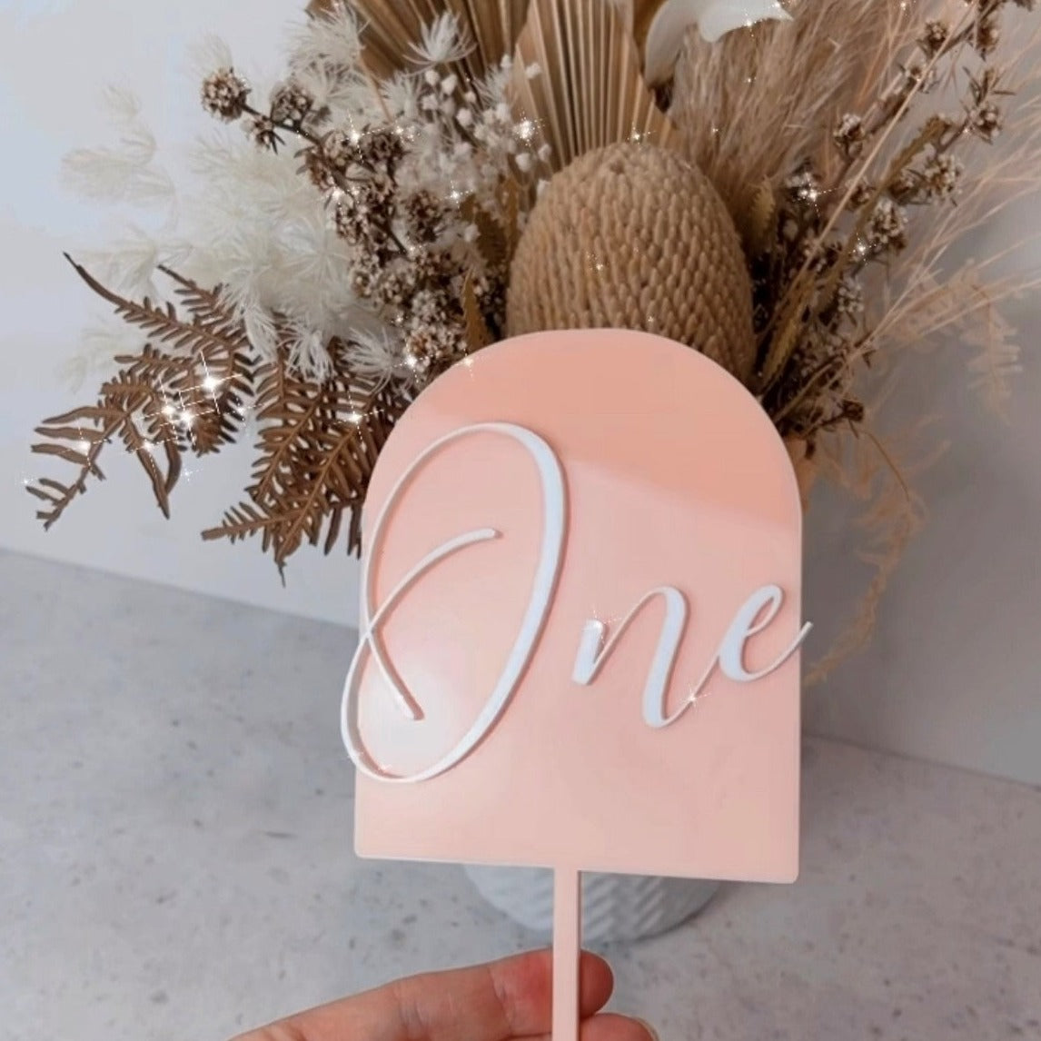 Arched number topper